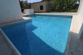 Turo 4 - Piso con piscina comunitaria
